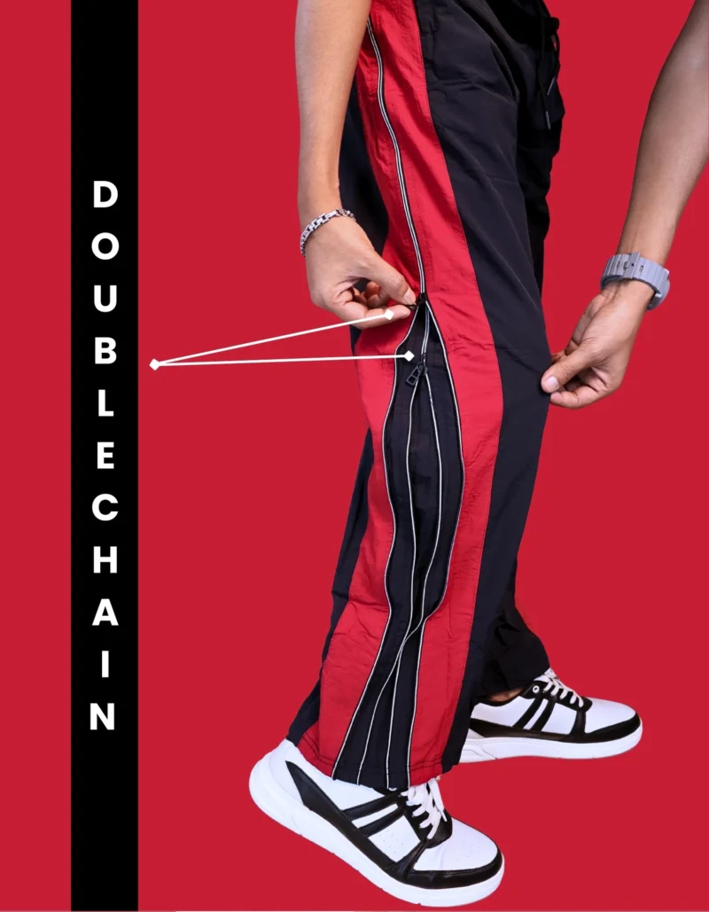 "Men's striped track pants side view showing Korean Style vertical text and colorblock design"